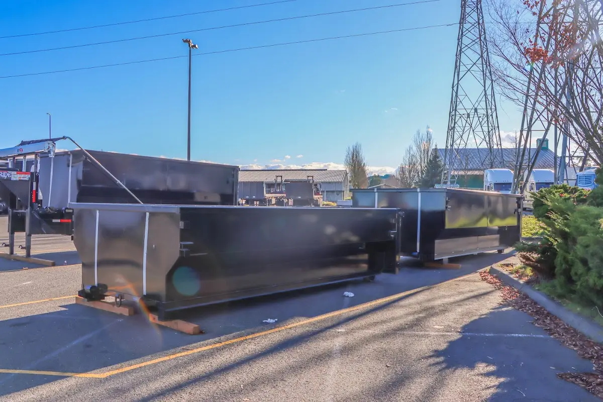 Roll-off dumpster ready for waste disposal at job site for 20 Yard Dumpster Rental in Iona